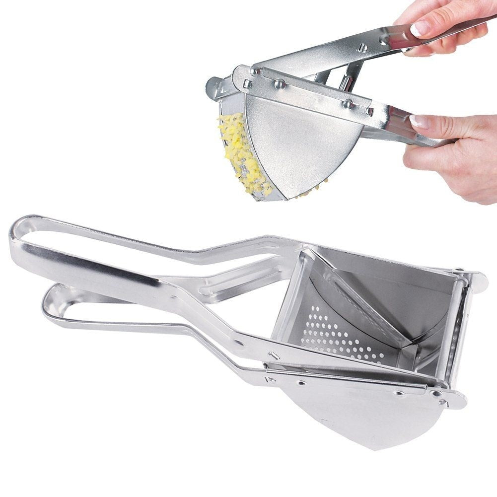 Potato press in galvanized metal for potatoes and fruit