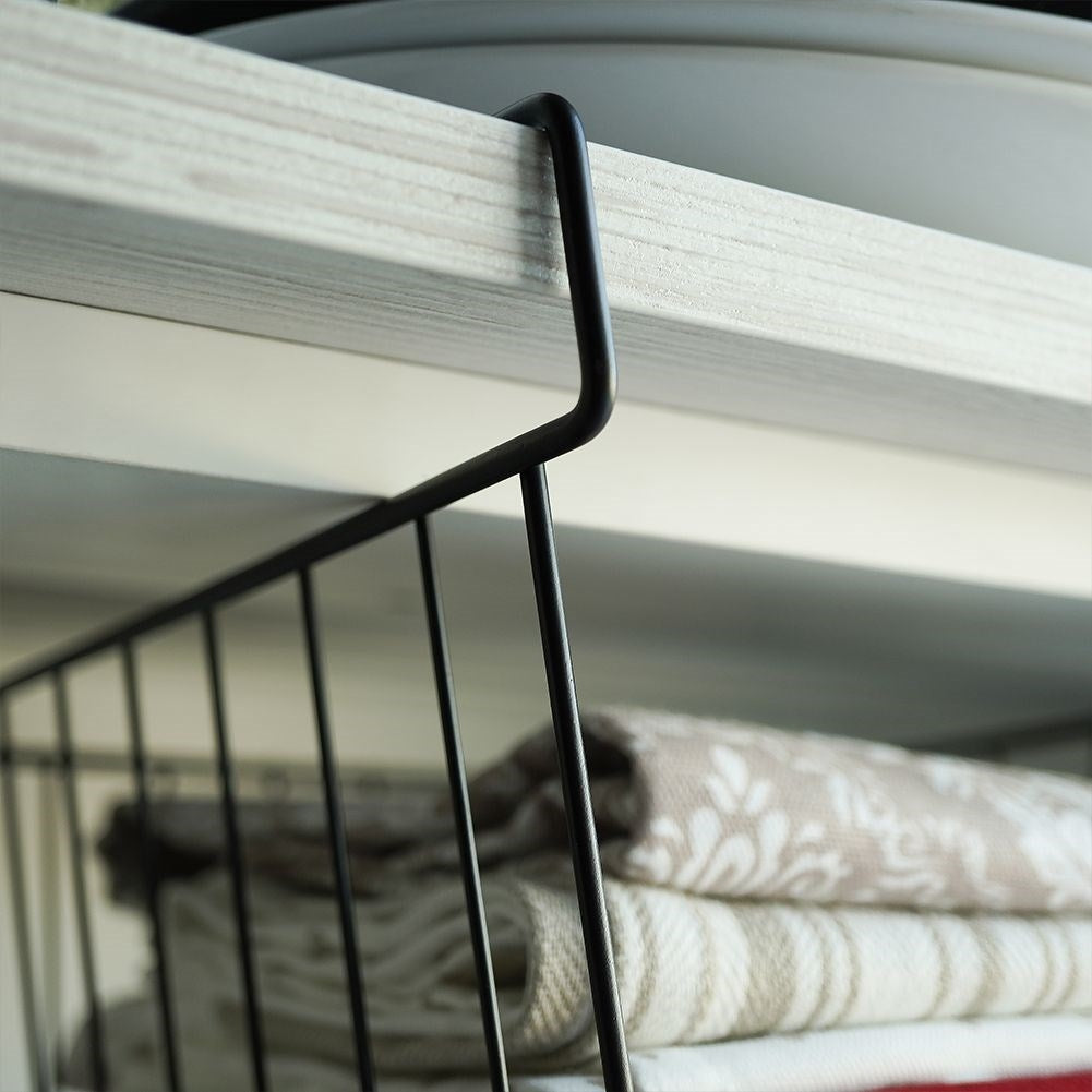Practical black metal basket for extra hanging storage