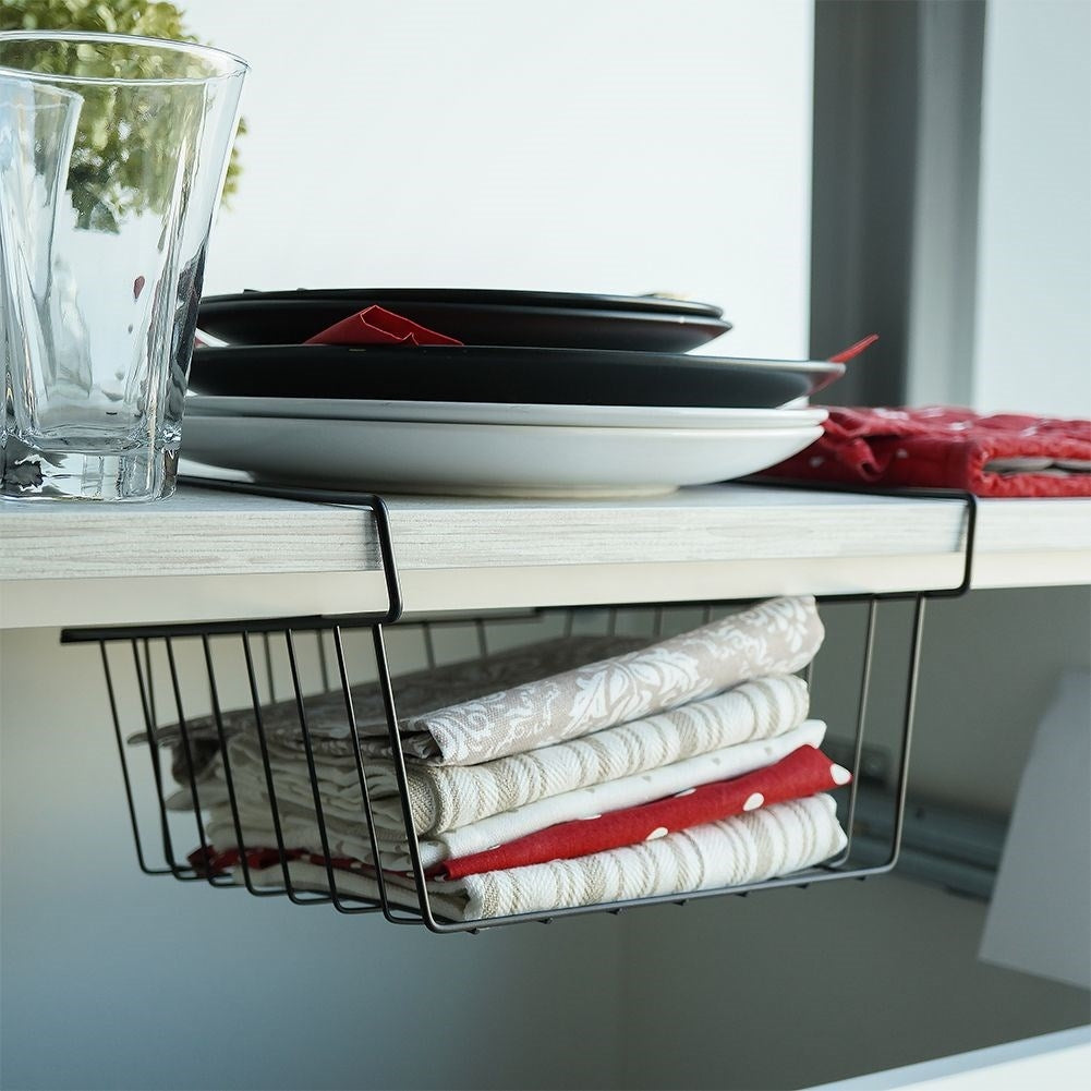 Practical black metal basket for extra hanging storage