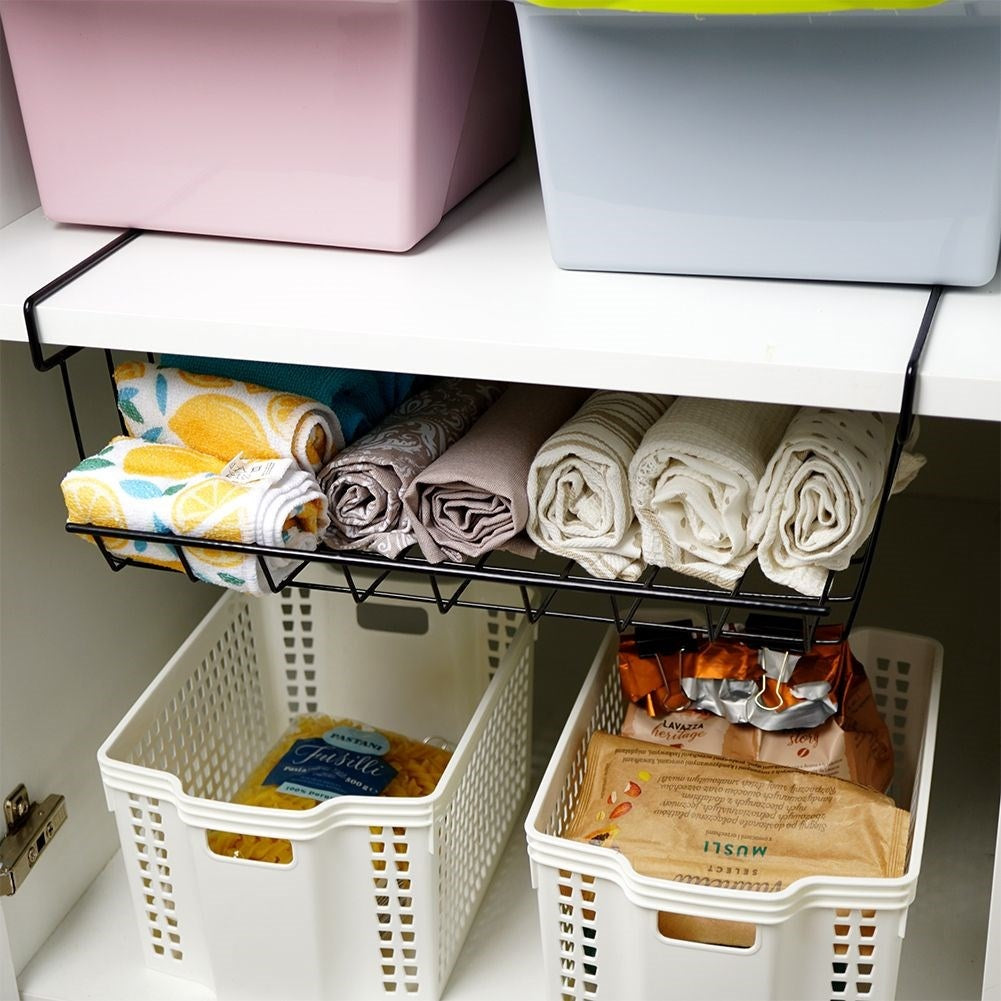 Practical black metal basket for extra space under the shelf