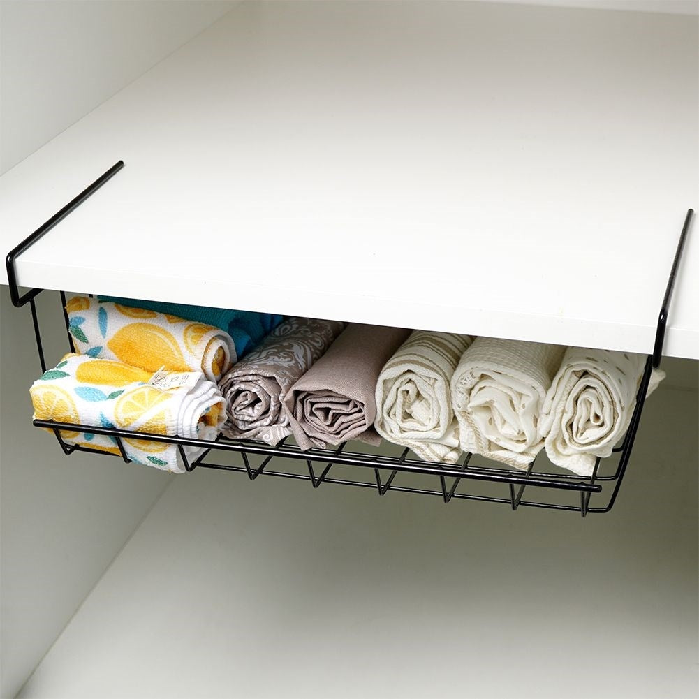 Practical black metal basket for extra space under the shelf