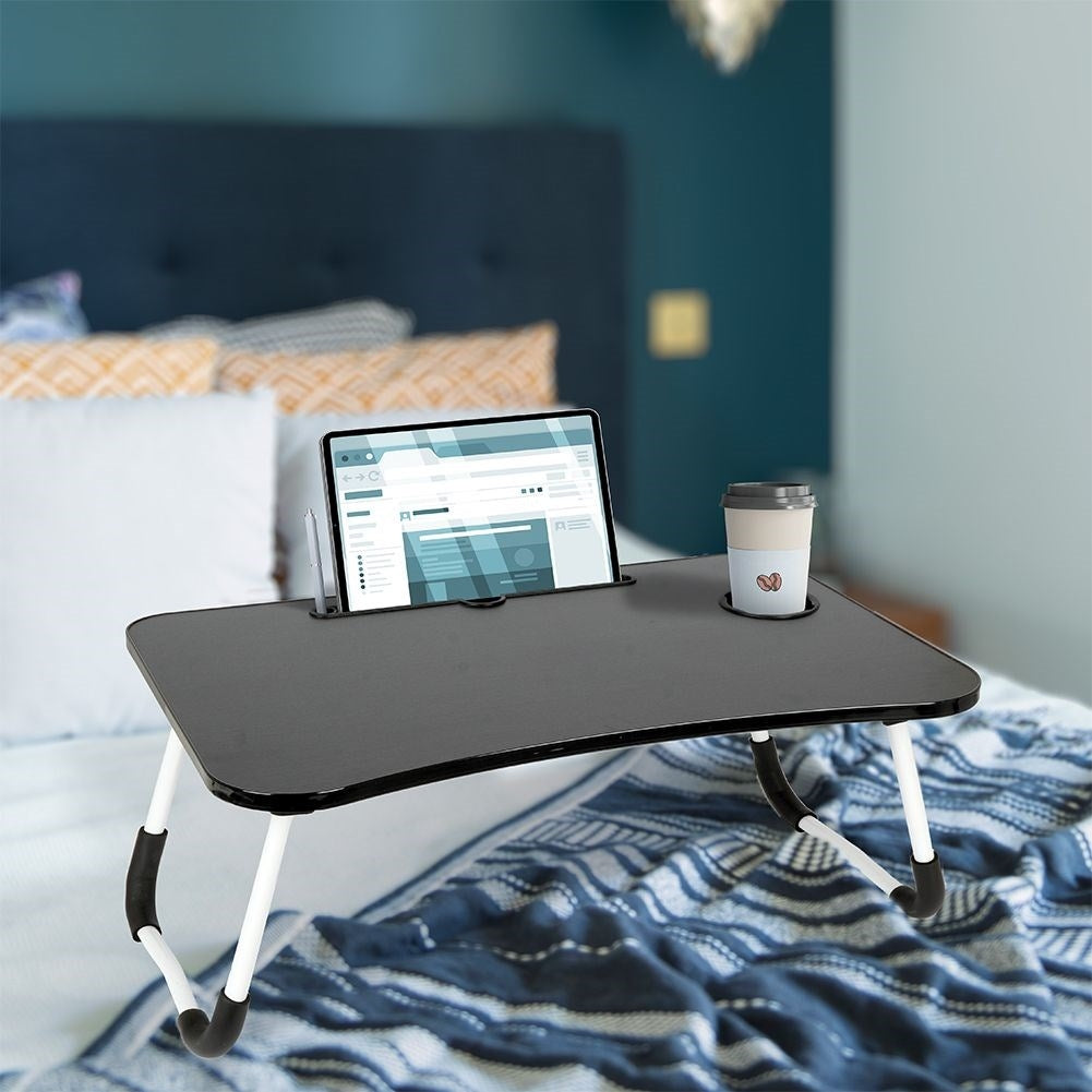 Practical breakfast table for the bed with space for a tablet