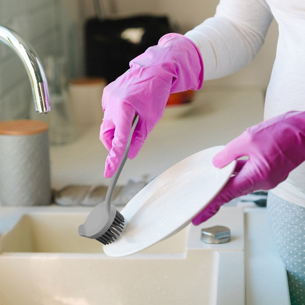 Practical gray plastic kitchen brush with silicone bristles.