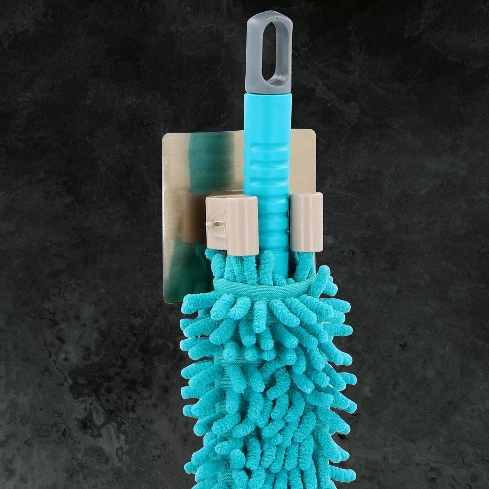 Practical holder for mops, brooms and tools