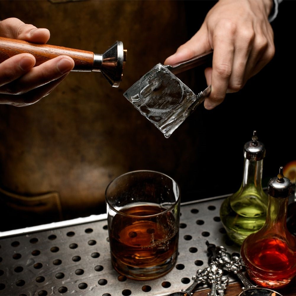 Practical ice mold with flexible bottom for easy ice cube removal