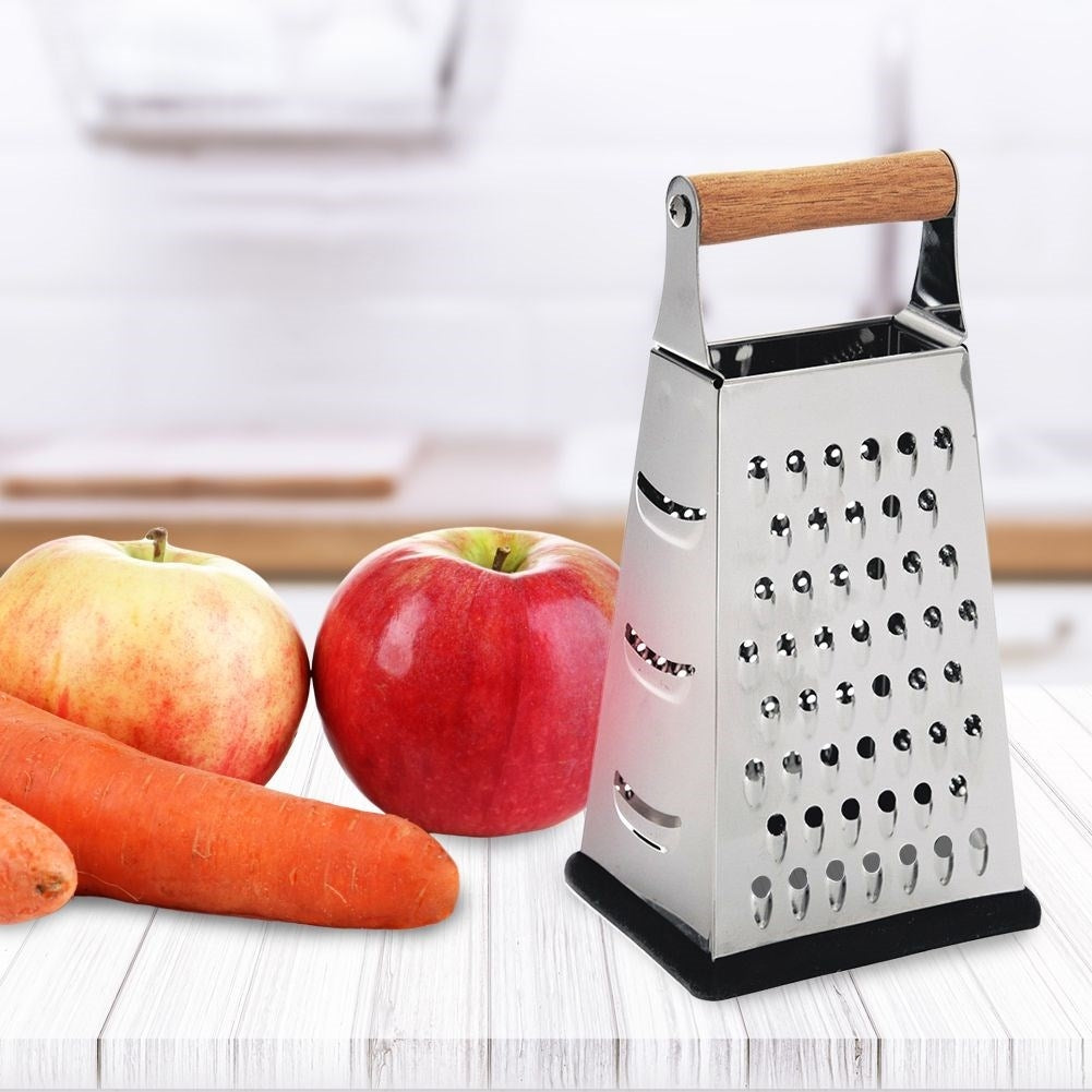 Practical kitchen grater with four stainless steel blades