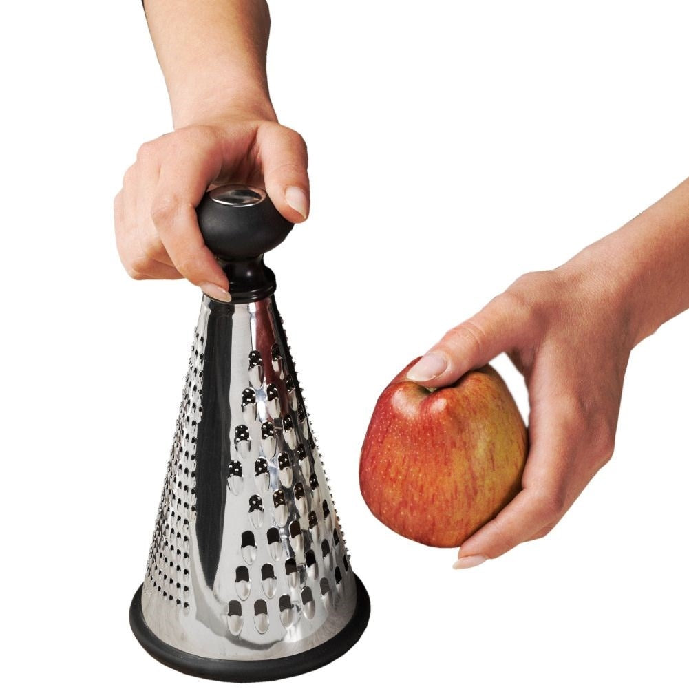 Practical kitchen grater with three blades for different tasks