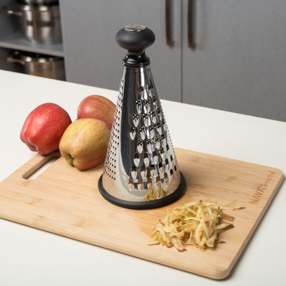 Practical kitchen grater with three blades for different tasks