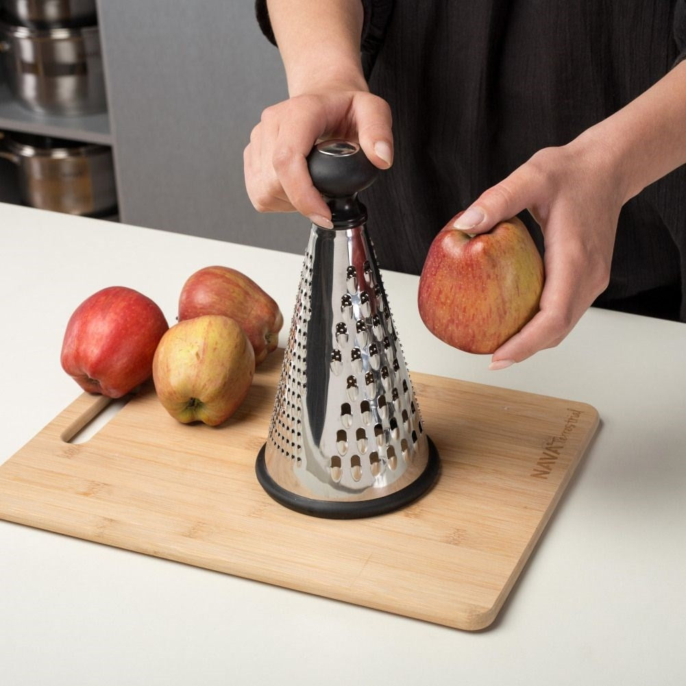 Practical kitchen grater with three blades for different tasks