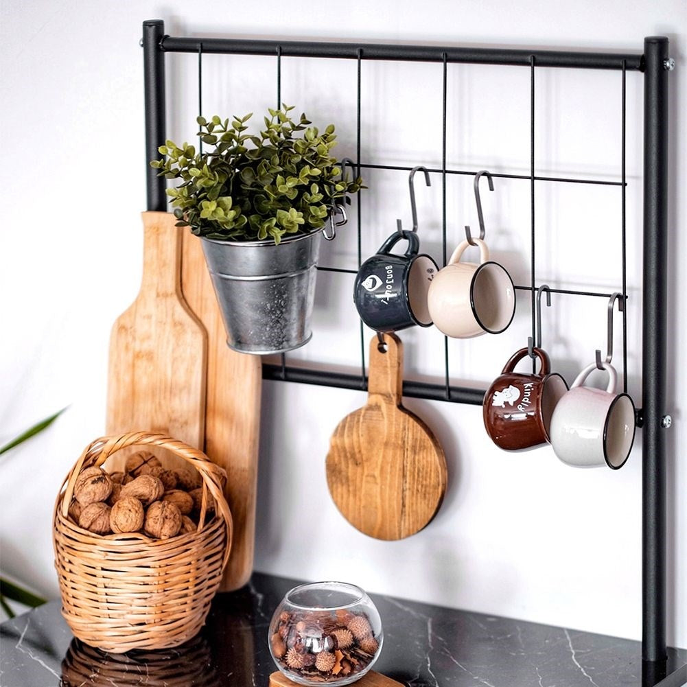 Practical kitchen shelf with extra storage and work surface