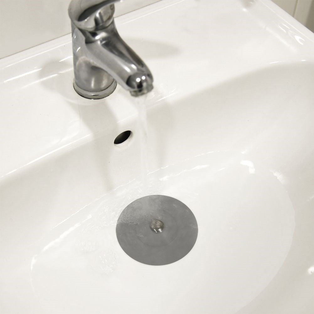 Practical silicone strainer that acts as a stopper and protects the sink