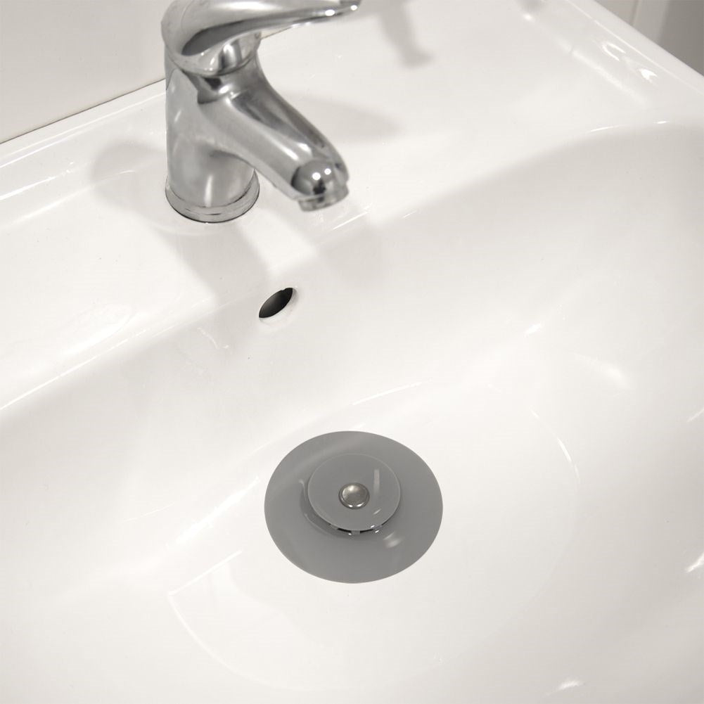 Practical silicone strainer that acts as a stopper and protects the sink
