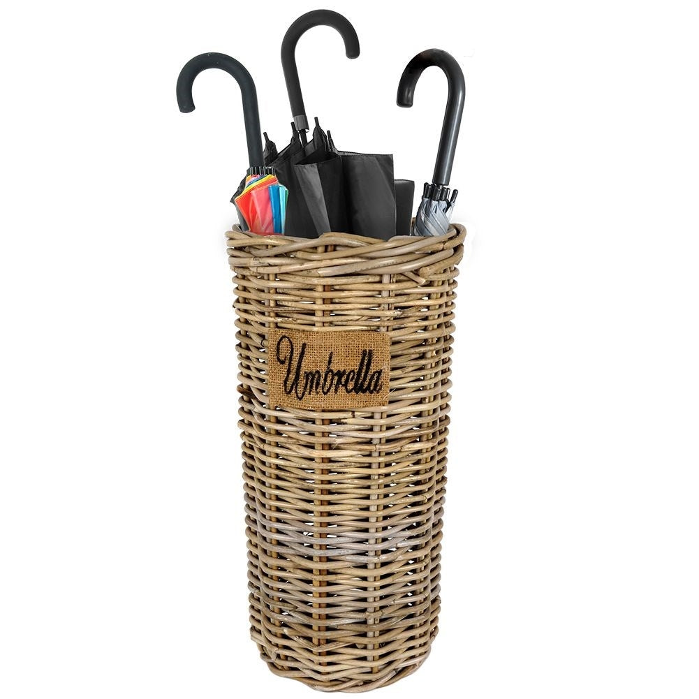 Practical umbrella stand in natural rattan, protects the floor.
