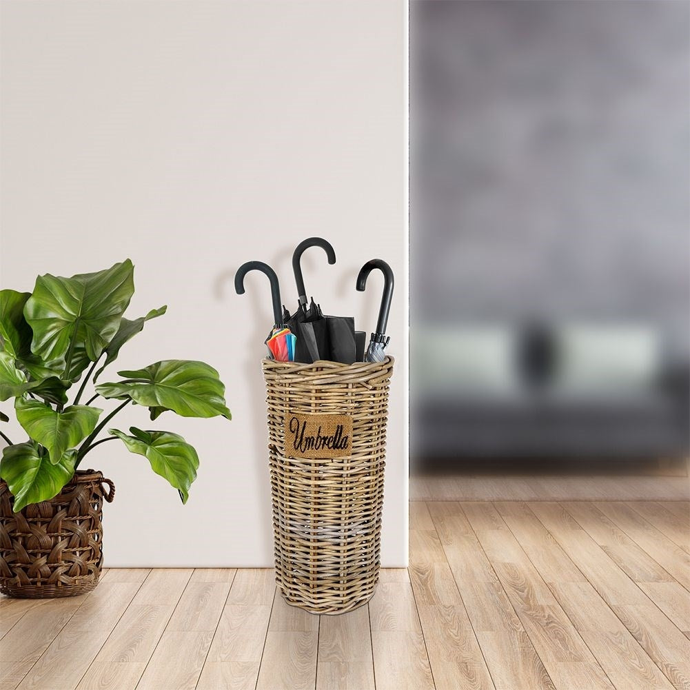 Practical umbrella stand in natural rattan, protects the floor.