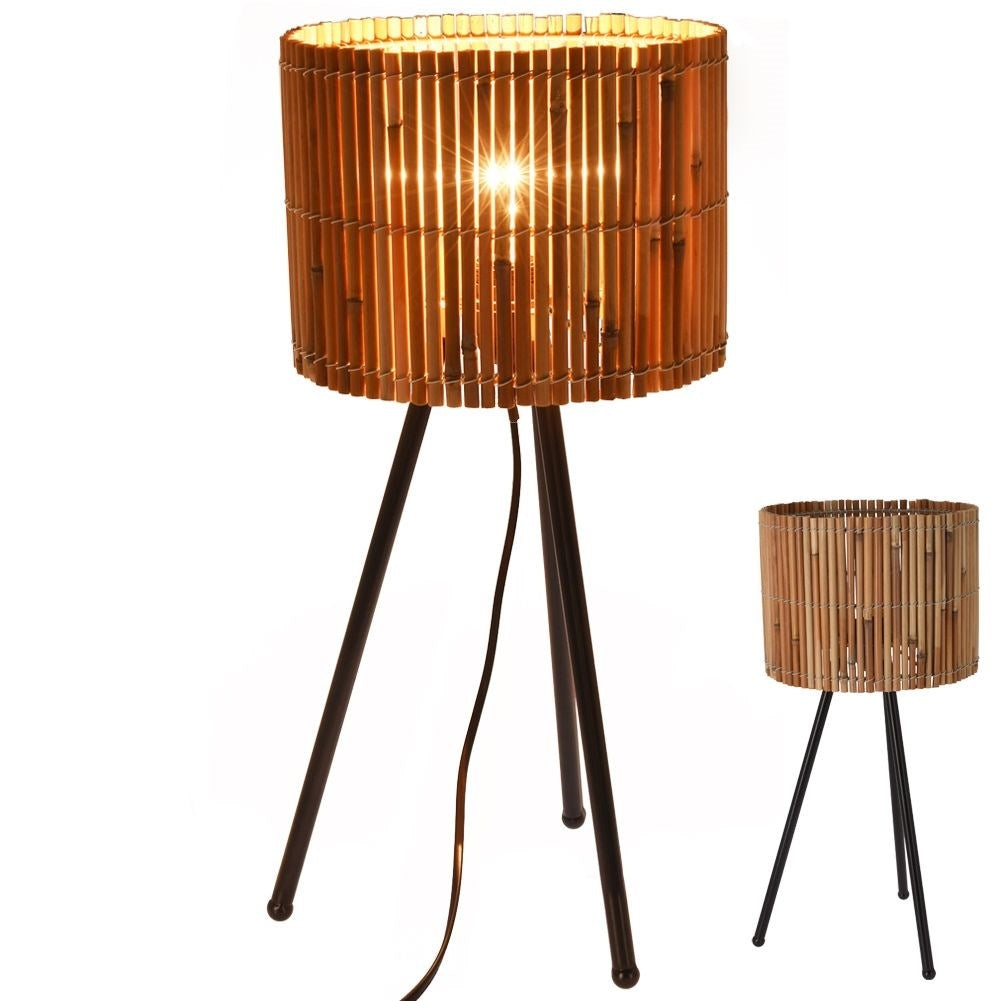 Rattan table lamp with black metal legs for any room