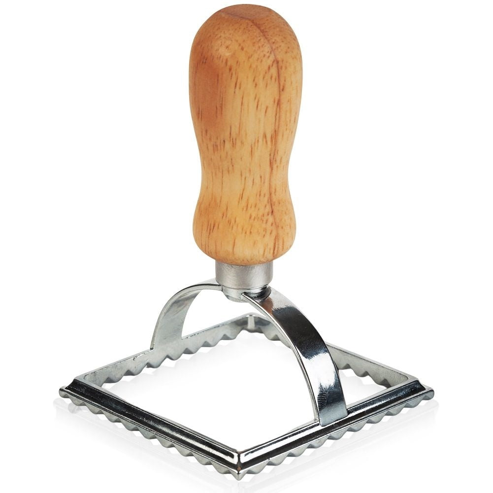 Ravioli cutter in metal and wood for uniform shapes