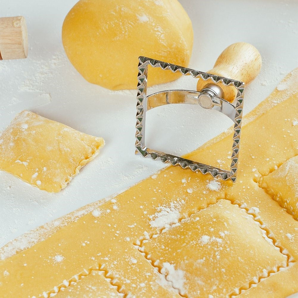 Ravioli cutter in metal and wood for uniform shapes