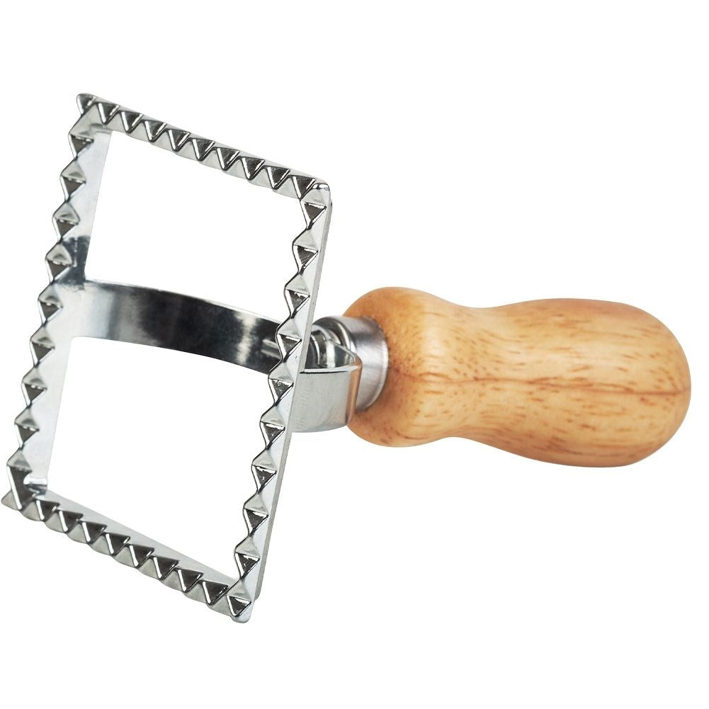 Ravioli cutter in metal and wood for uniform shapes