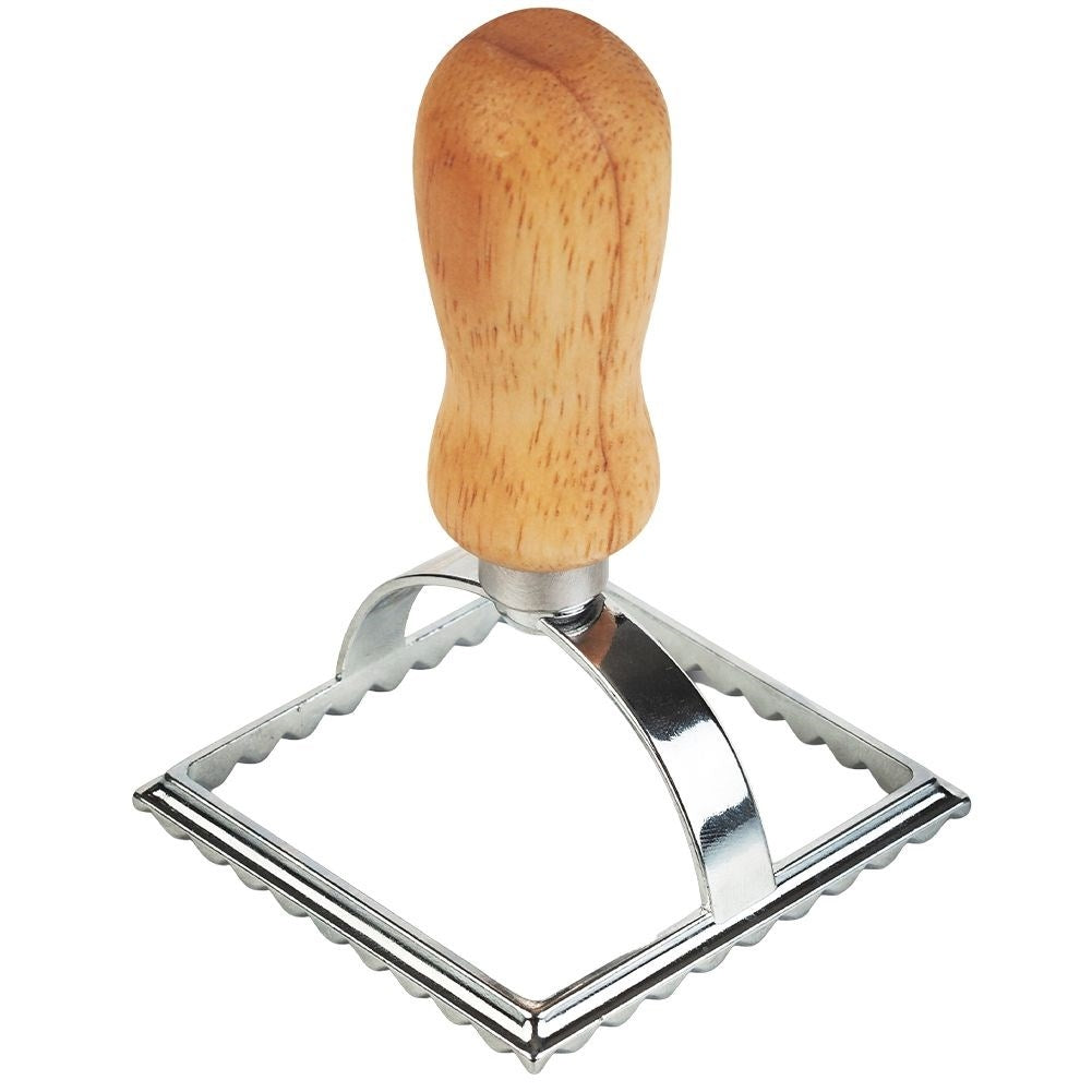 Ravioli cutter in metal and wood for uniform shapes