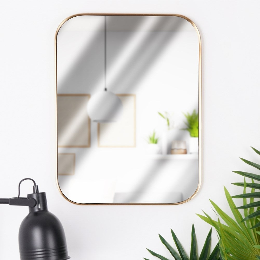 Rectangular wall mirror with gold frame and rounded corners