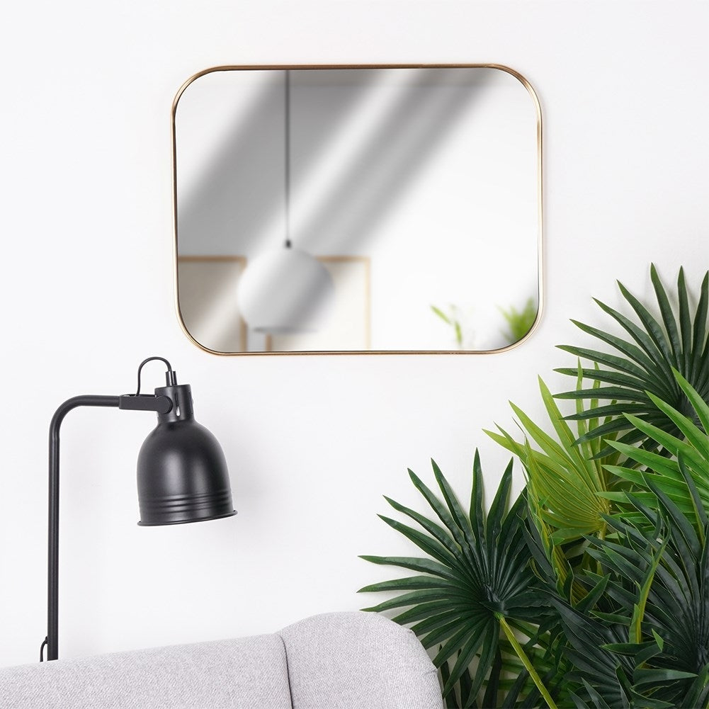Rectangular wall mirror with gold frame and rounded corners