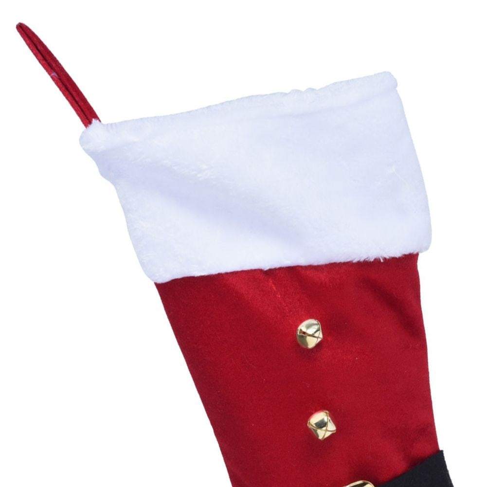 Red Christmas stocking in soft material for Christmas gifts and presents