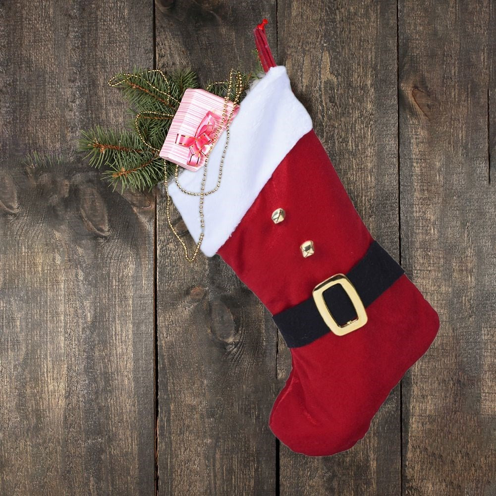 Red Christmas stocking in soft material for Christmas gifts and presents