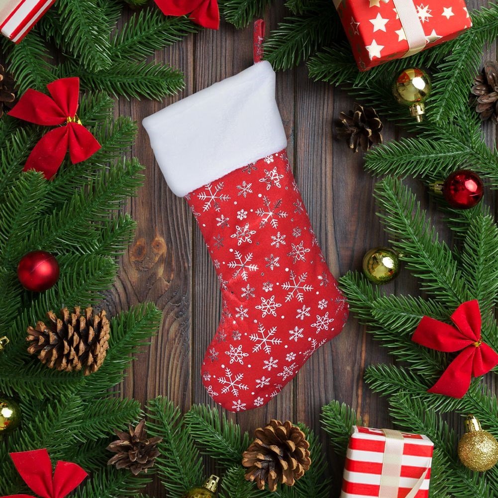 Red Christmas stocking with silvery snowflakes, soft material