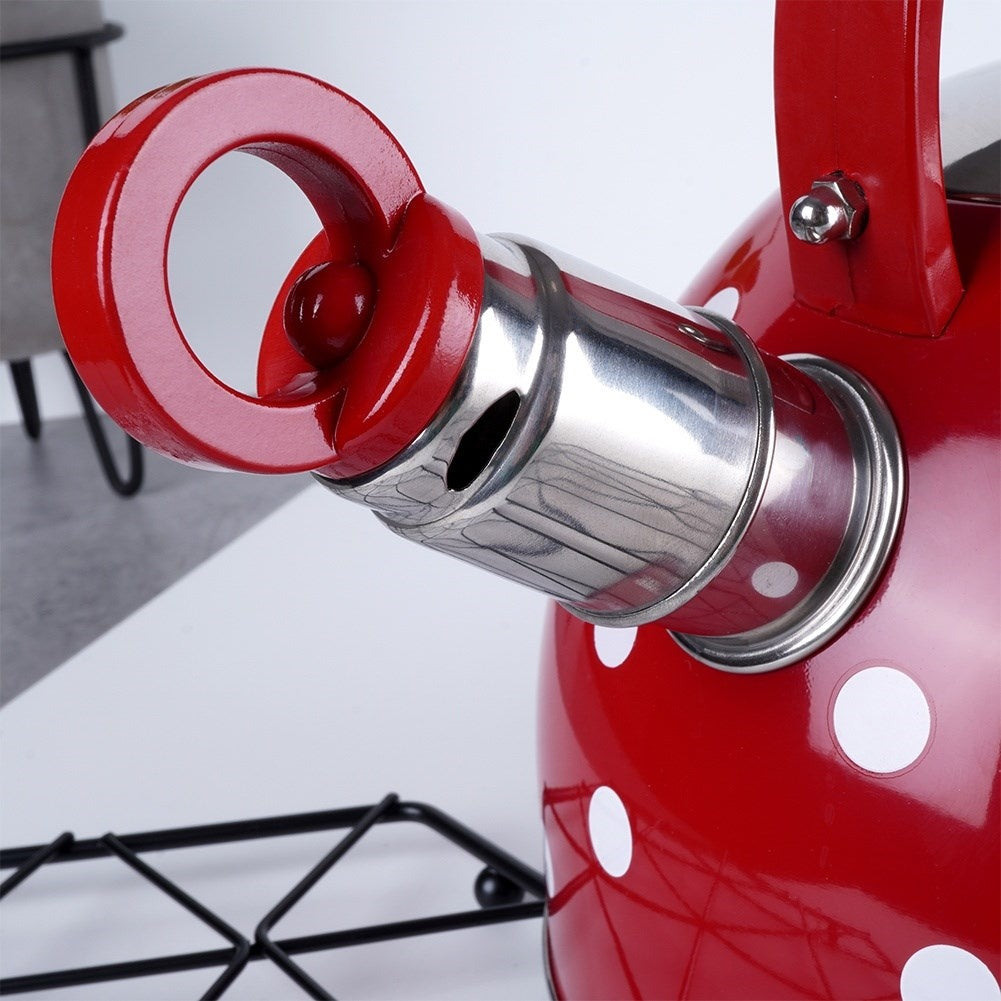 Red teapot in stainless steel with dots and whistle