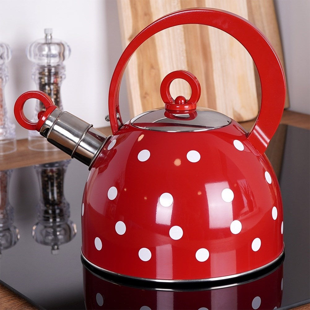 Red teapot in stainless steel with dots and whistle