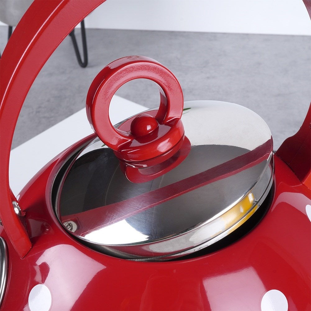 Red teapot in stainless steel with dots and whistle