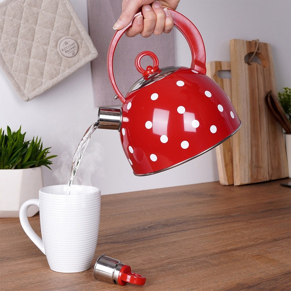 Red teapot in stainless steel with dots and whistle