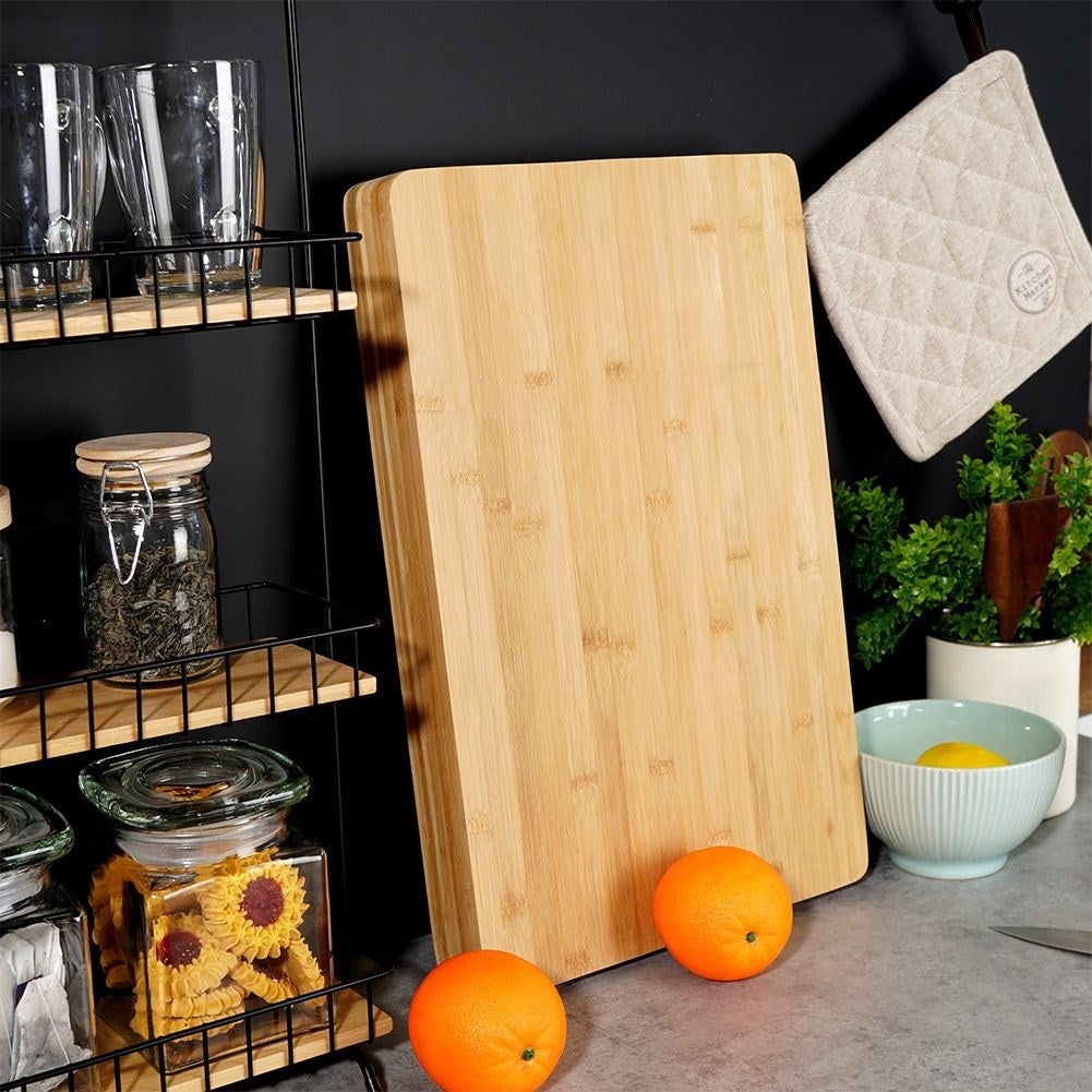 Robust bamboo cutting board for cutting and serving food