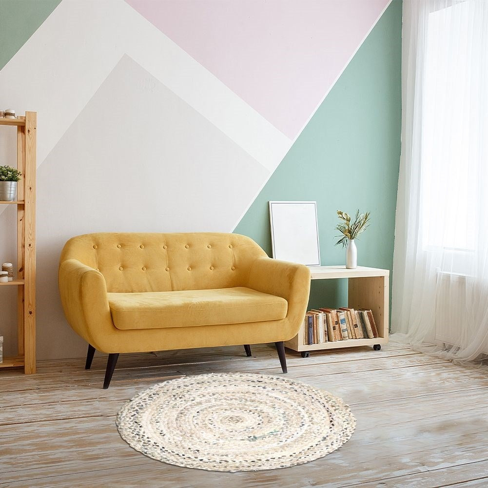 Round beige cotton rug with an interesting pattern