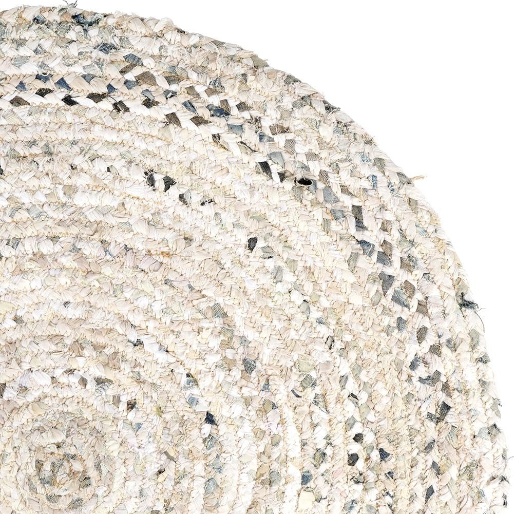Round beige cotton rug with an interesting pattern