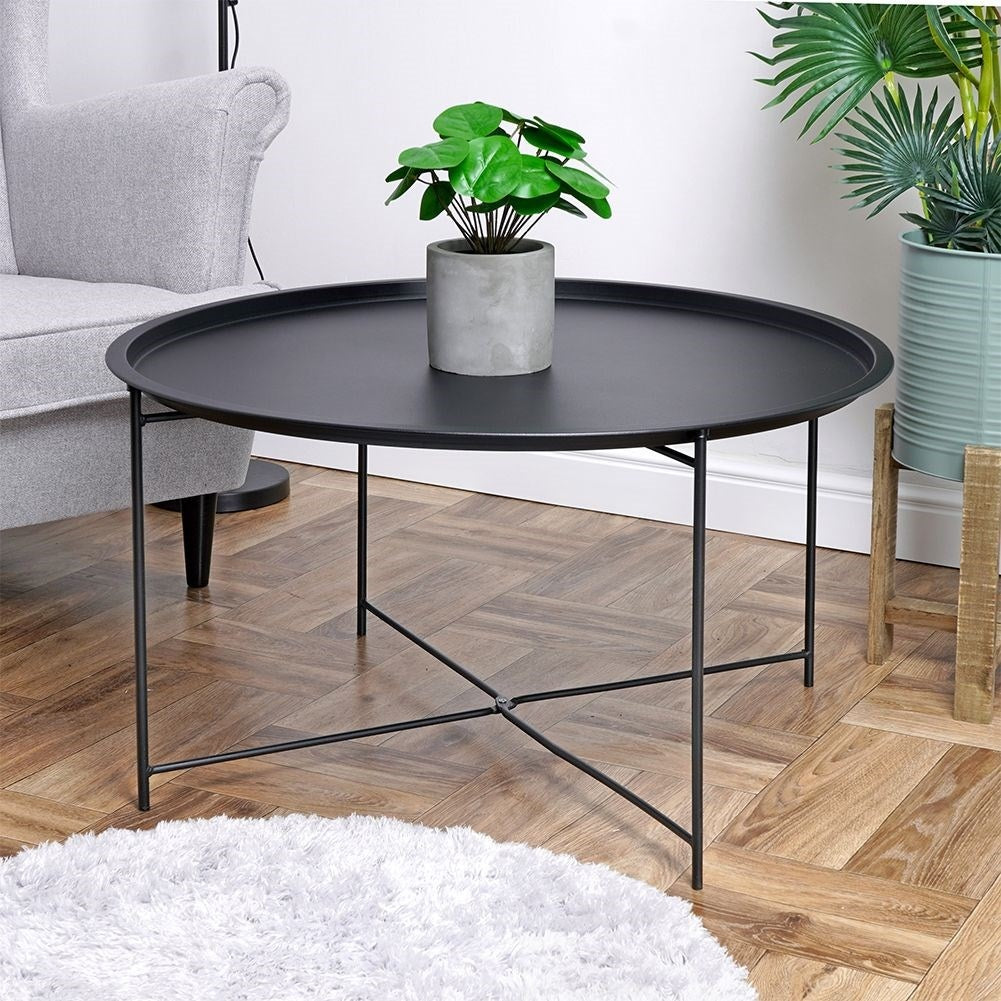 Round black metal coffee table for industrial loft style, 75 cm