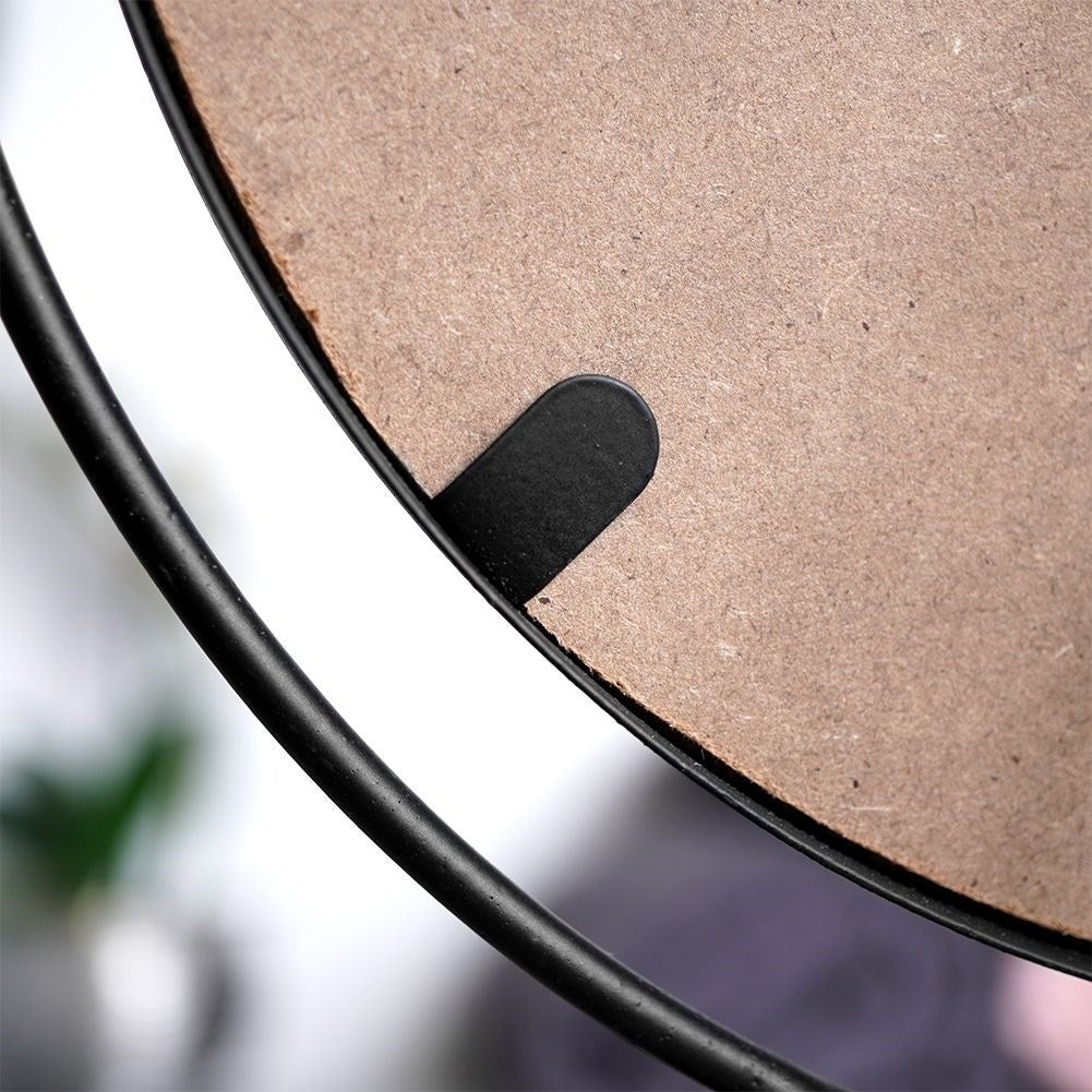 Round cosmetic mirror with stand in stylish black metal