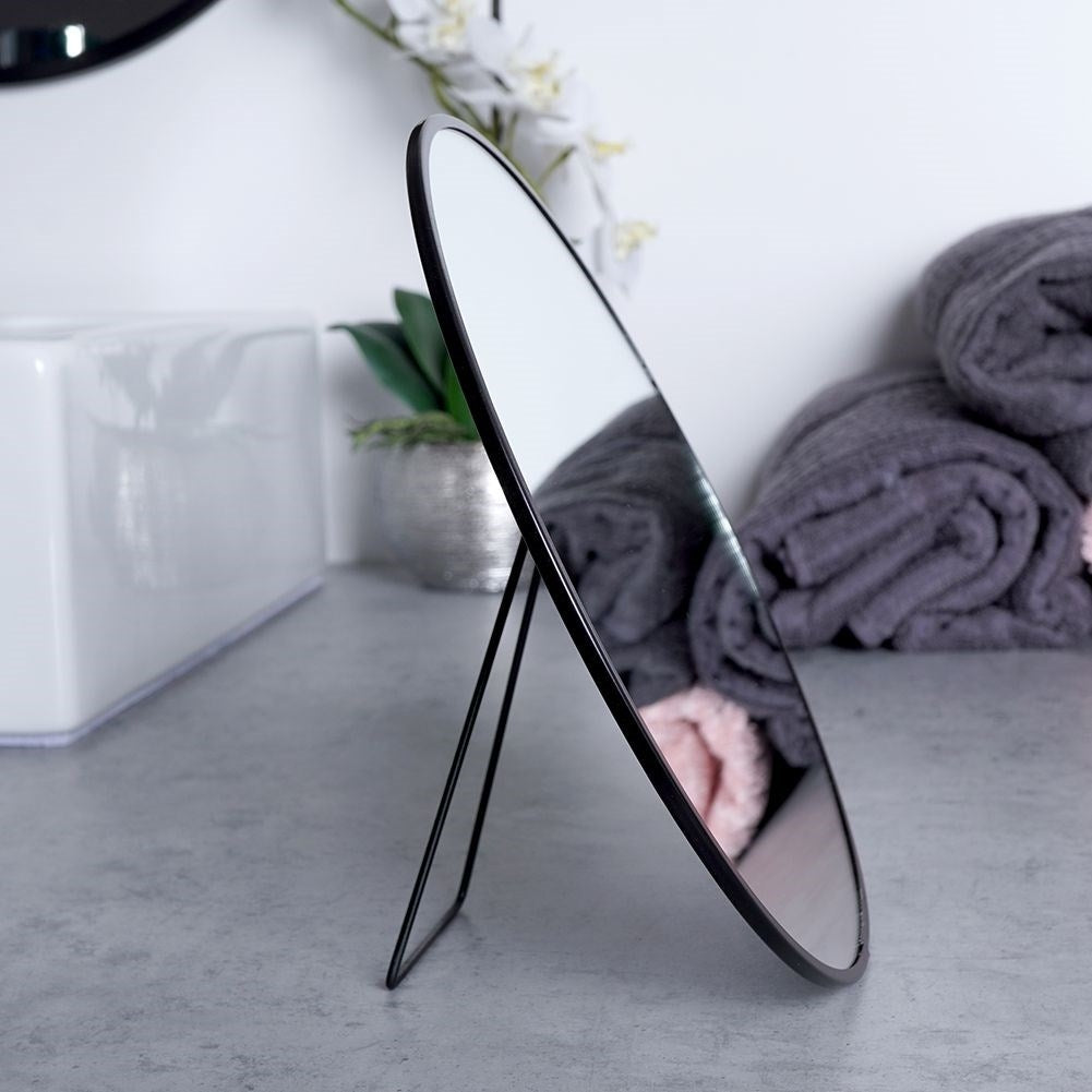 Round makeup mirror on stand, black metal, versatile use