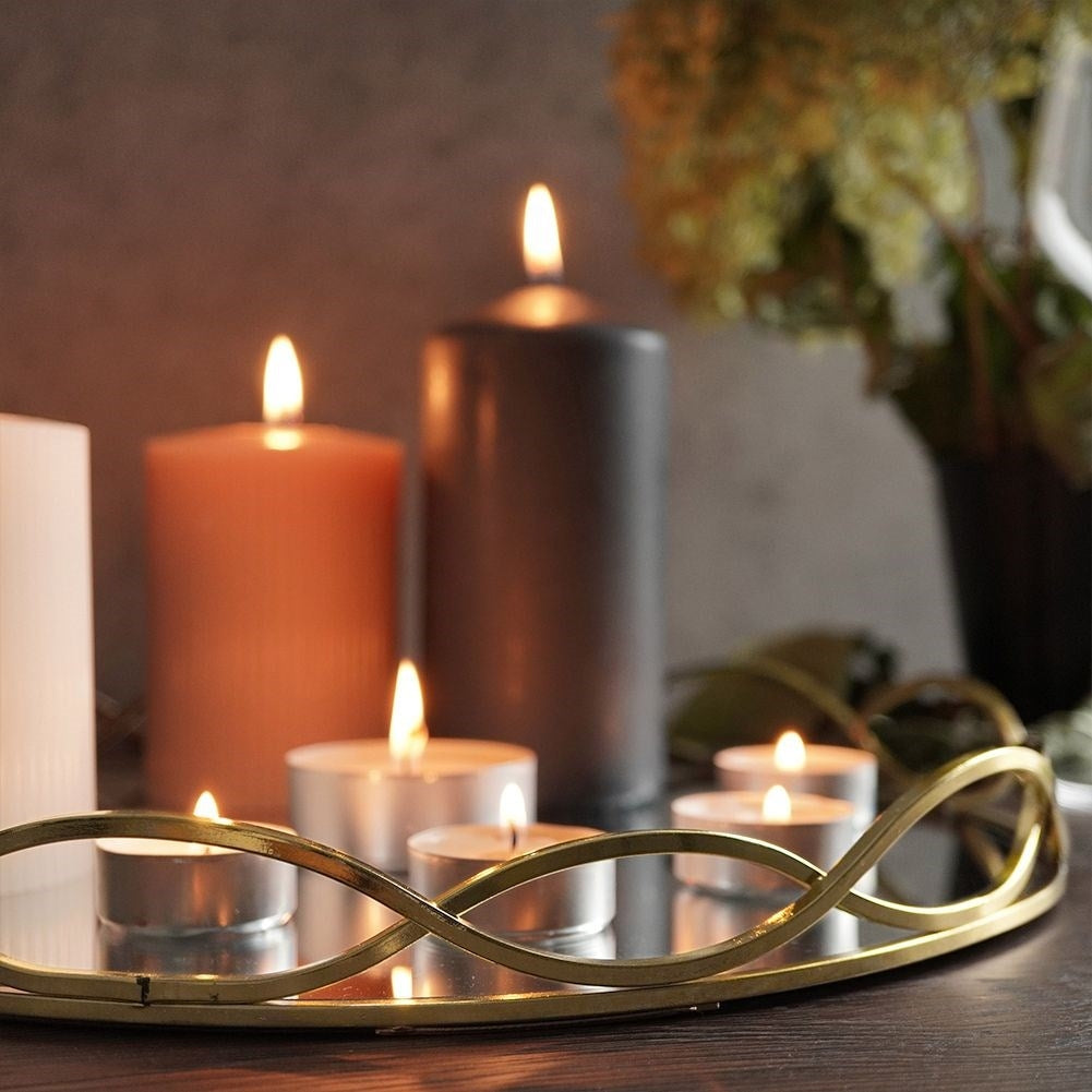 Round mirror tray for candles in gold and mirror glass