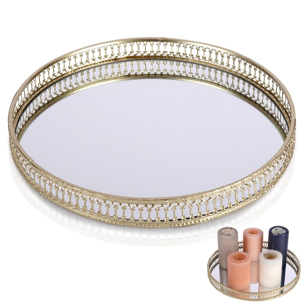 Round mirror tray in gold and glass for candles.