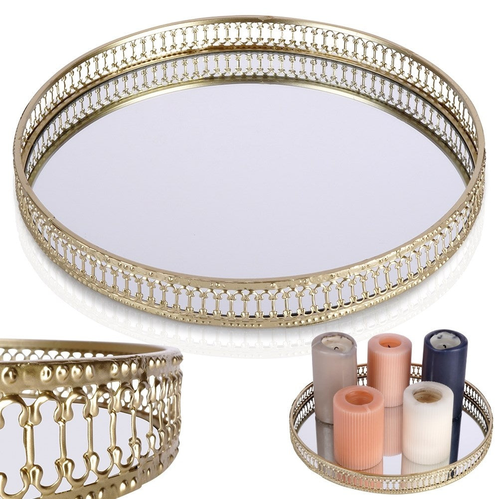 Round mirror tray in gold and glass for candles.