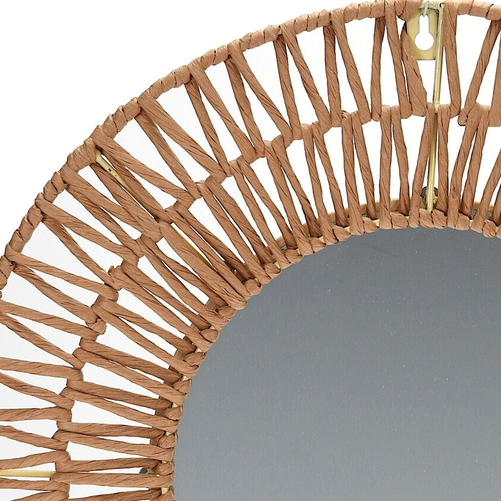 Round mirror with gray braided paper frame for the wall