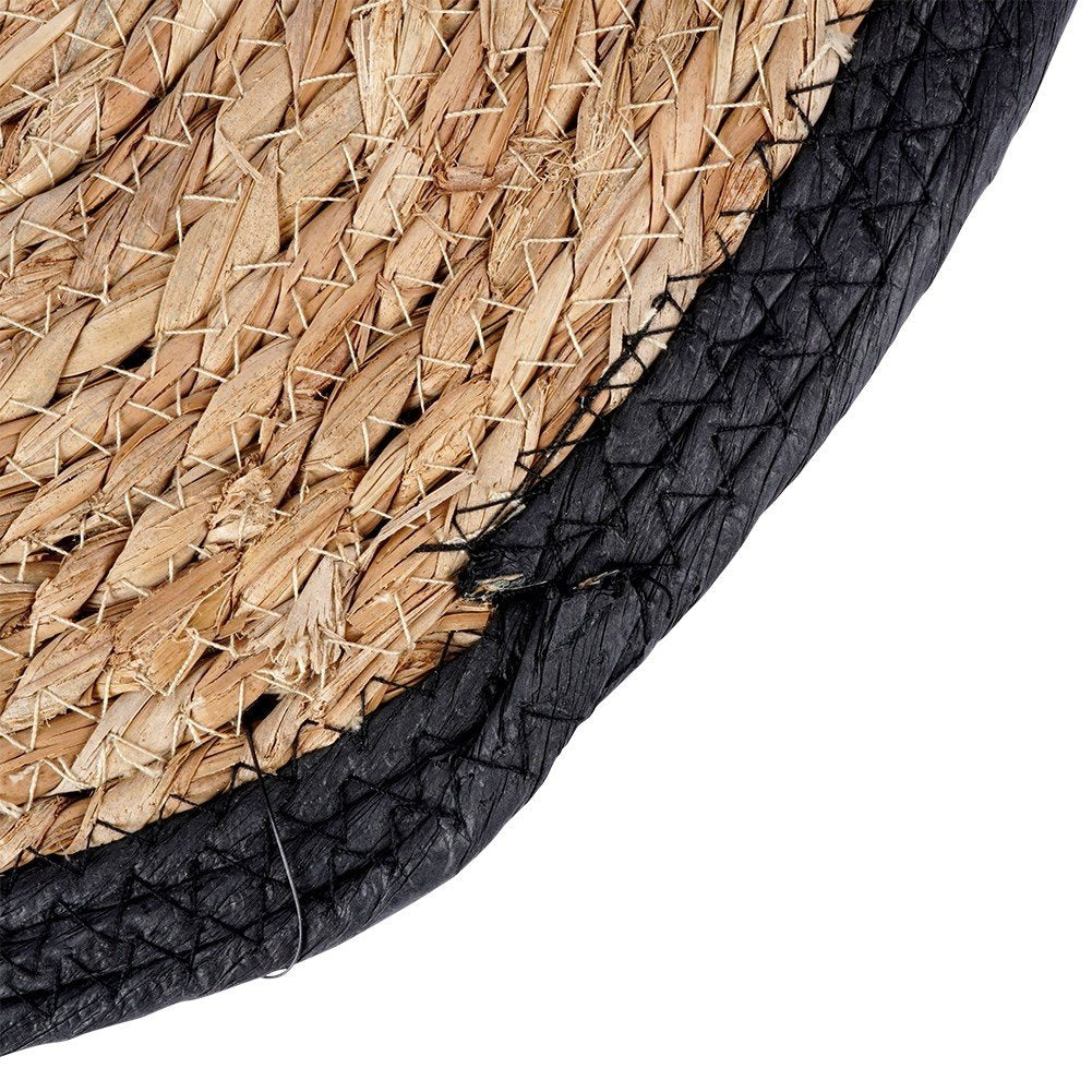 Round placemat made of plaited seaweed for all interiors