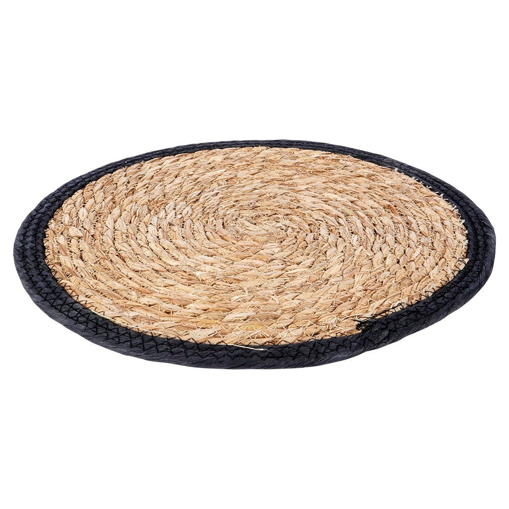 Round placemat made of plaited seaweed for all interiors
