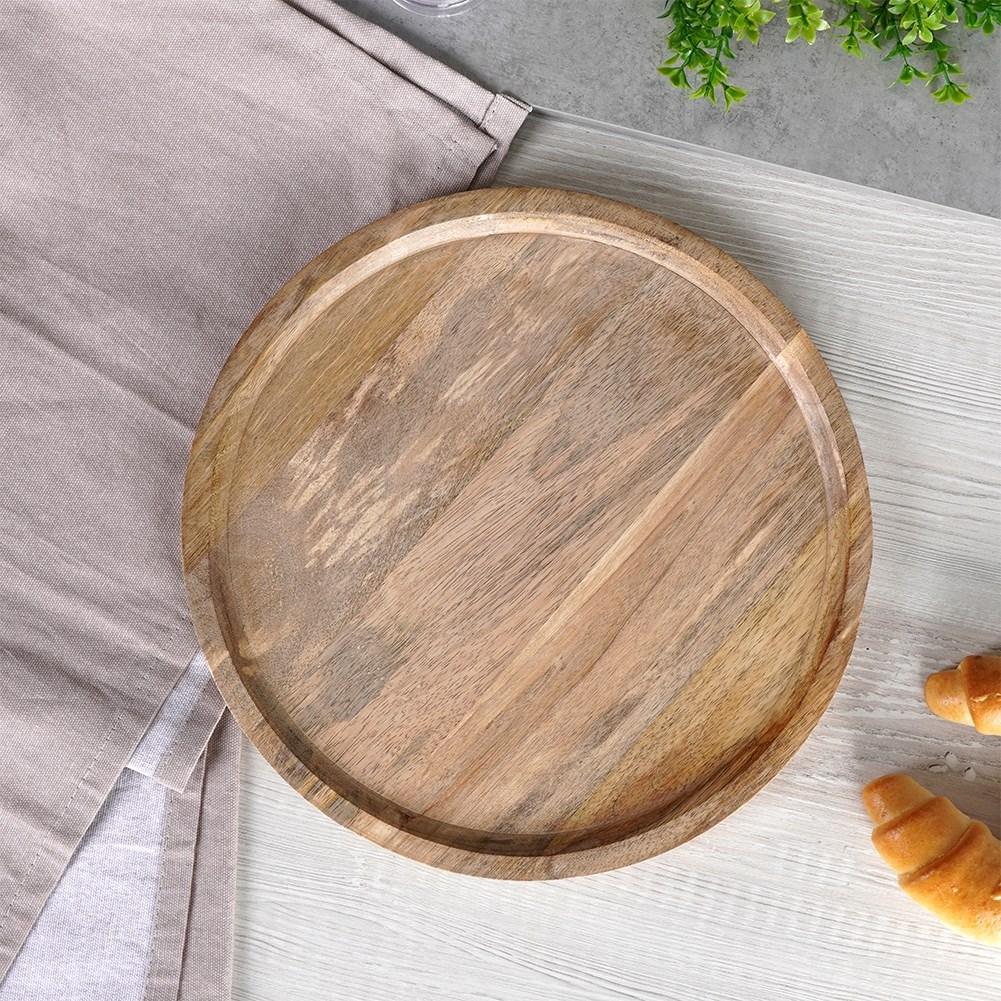 Round tray made of durable exotic mango wood
