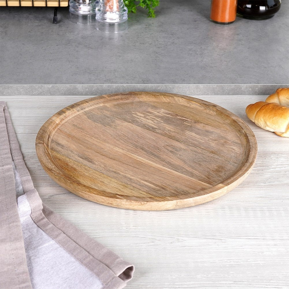 Round tray made of durable exotic mango wood