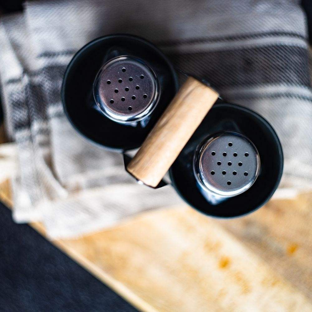 Salt and Pepper Shakers in Glass with Metal Stand