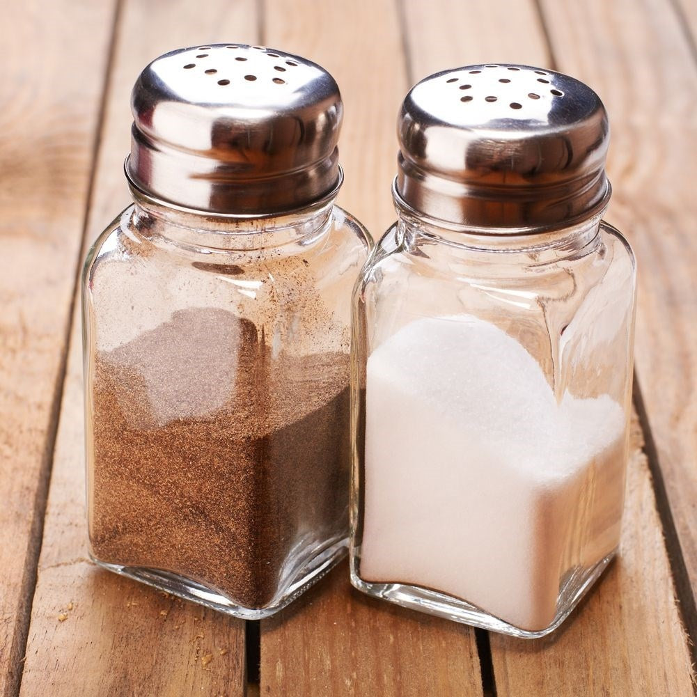 Salt and Pepper Shakers in Glass with Metal Stand