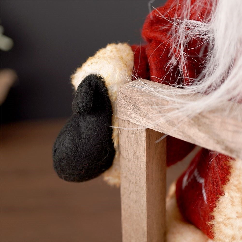 Santa on a sleigh: 47 cm high winter decoration with bell