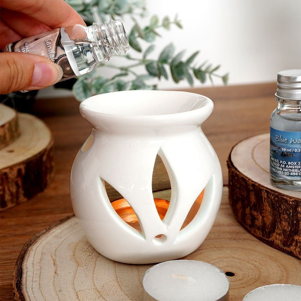 Scent diffuser in white ceramic with 12 scents and tealight candle